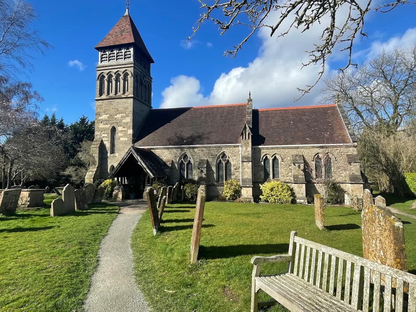 St James the Great church, Old Milverton, seen through the churchyard trees